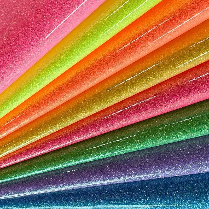 Qual é a diferença entre tecido glitter e papel glitter?